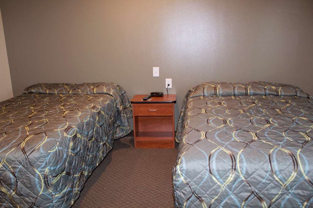 Woodspring Suites Williston Quarto foto